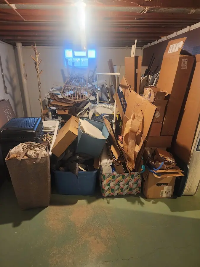 Roll-off dumpster container at job site for Concrete Dumpster Rental in Harrisville